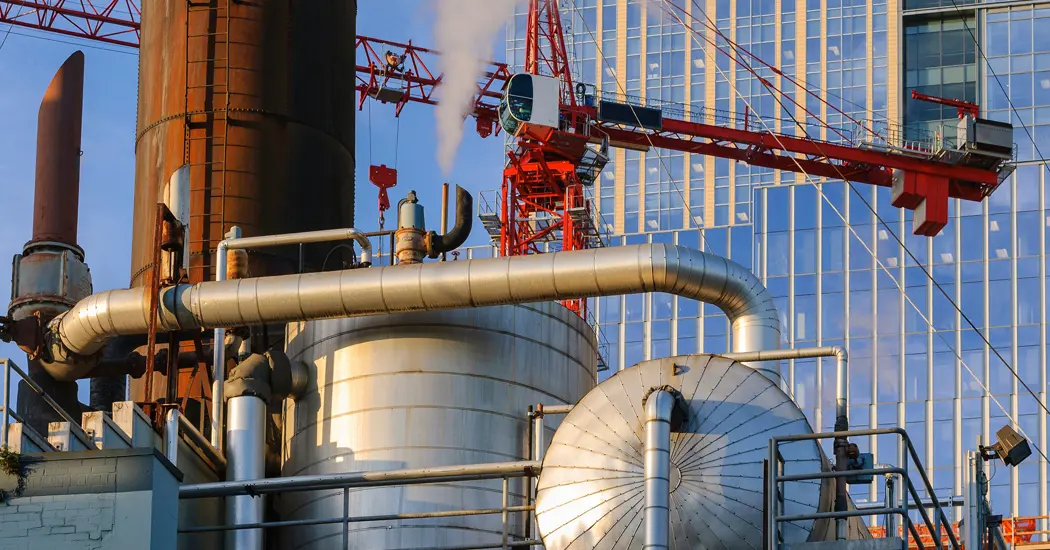 image is Steam From Pipe Near Highrise 2023 11 27 05 33 42 Utc 2