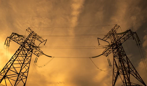 Global utilities plan to invest more than $116 billion annually in grids and renewables Electrical Grid And Transmission Line At Dusk 2023 11 27 04 54 50 Utc