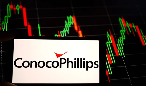 Conocophillips logo on a phone screen with data in the background
