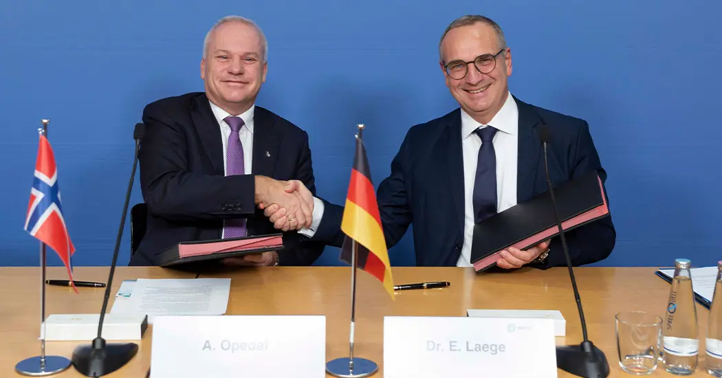 image is Deal Signing (1)